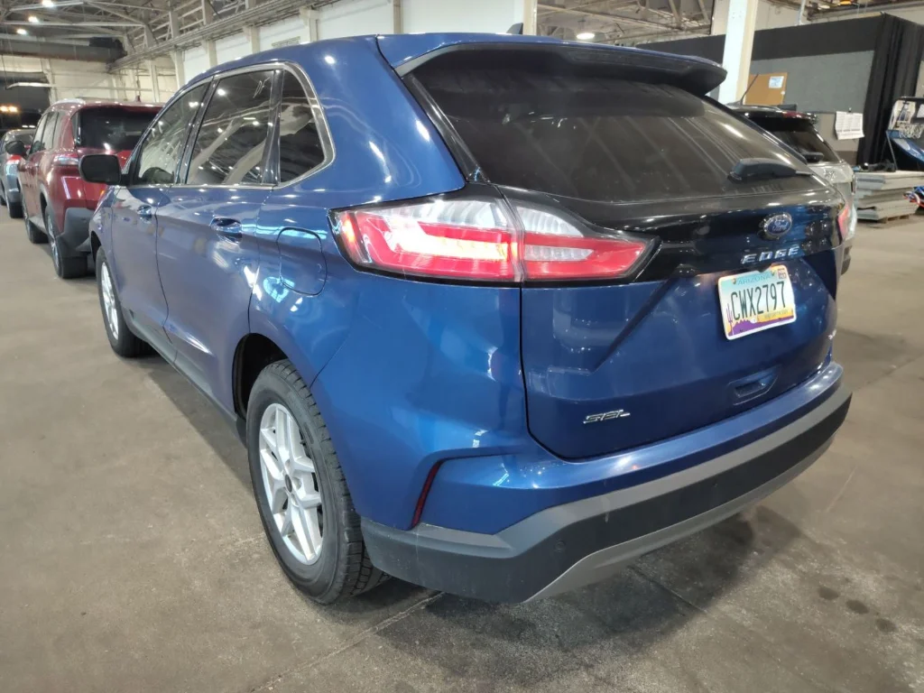 Used 2024 Atlas Blue Metallic Ford SEL image 2