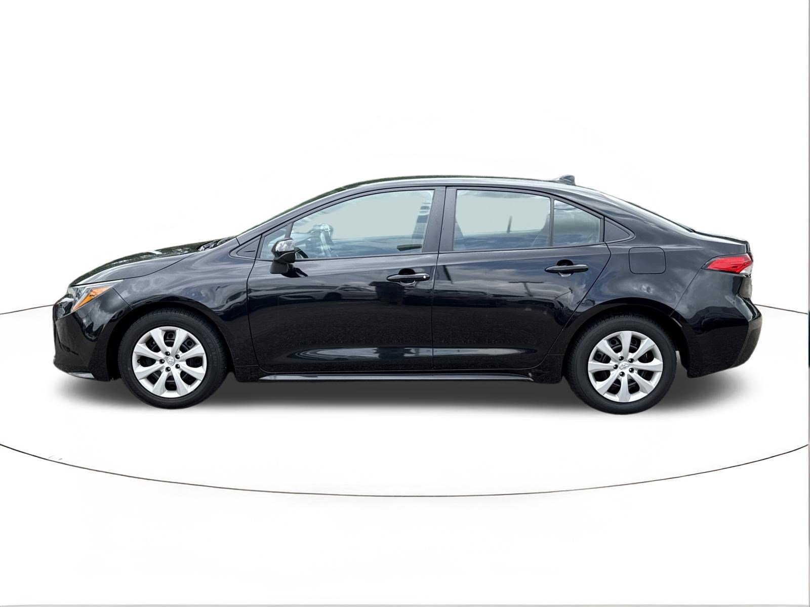Used 2024 Midnight Black Metallic Toyota LE image 6