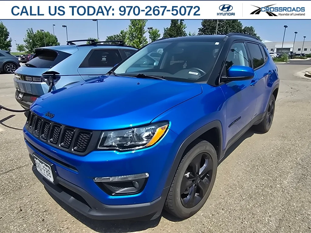 Used 2019 Laser Blue Pearlcoat Jeep Altitude image 1
