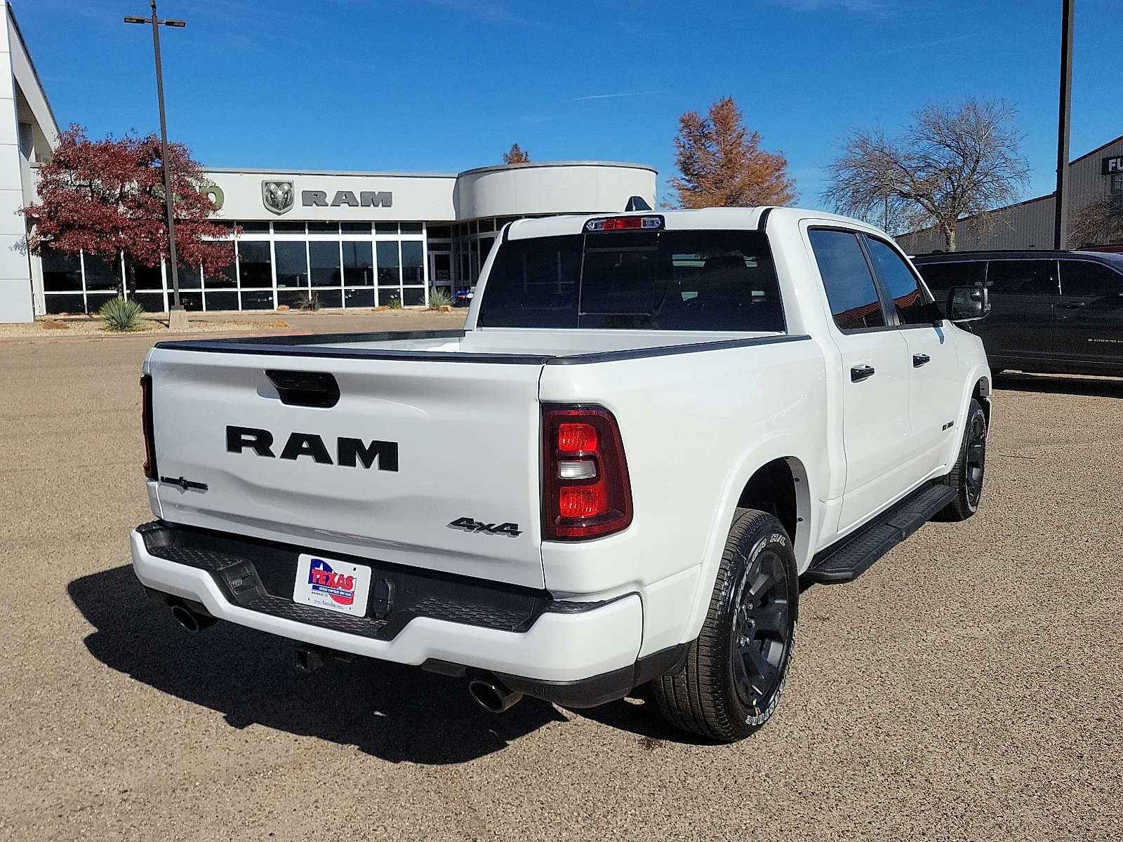 New 2026 PW7 Bright Whit Ram LONE STAR CREW CAB 4X4 5