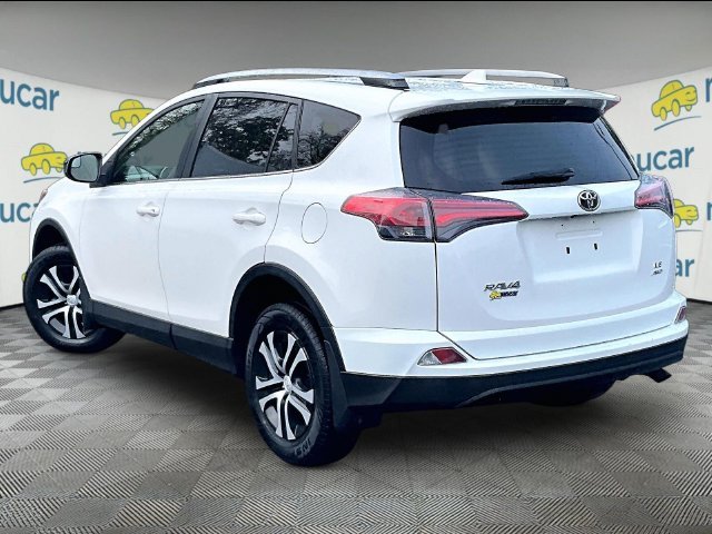 Used 2018 Super White Toyota LE image 2