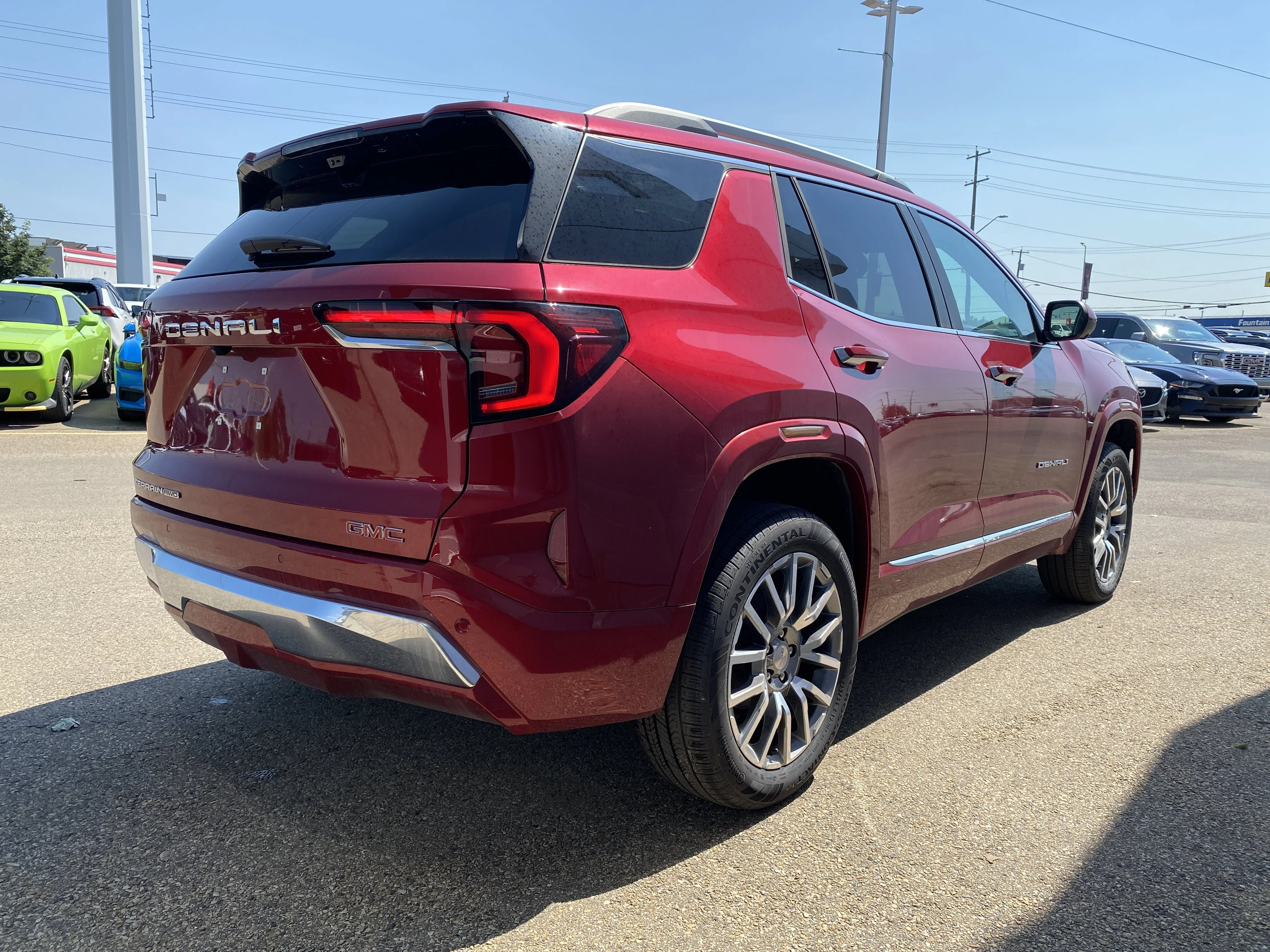 New 2026 VOLCANIC RED TINTCOAT GMC AWD Denali image 7