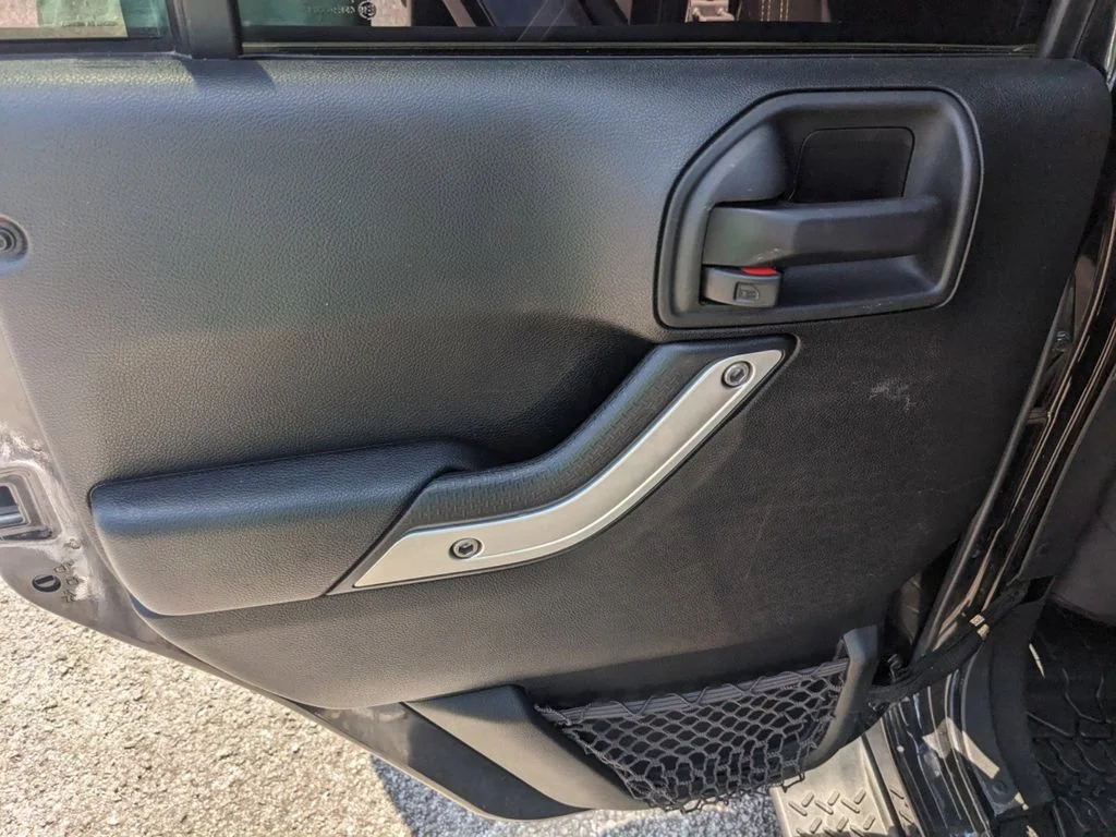 Used 2017 black Jeep 4d Convertible Sahara image 13
