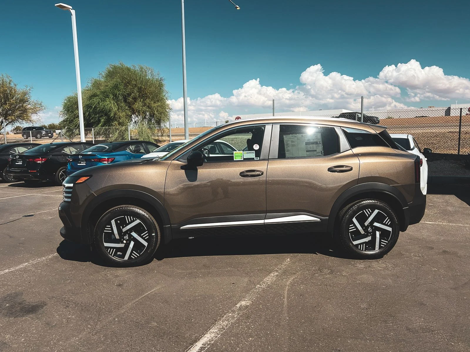 New 2026 Canyon Bronze Metallic Nissan SV image 8