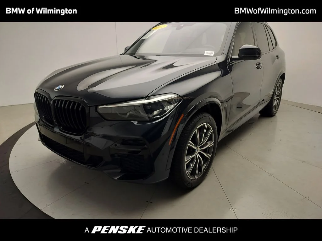 Used 2022 Black BMW sDrive40i image 1