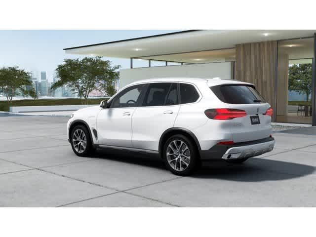 Used 2026 Mineral White Metallic BMW xDrive50e image 2