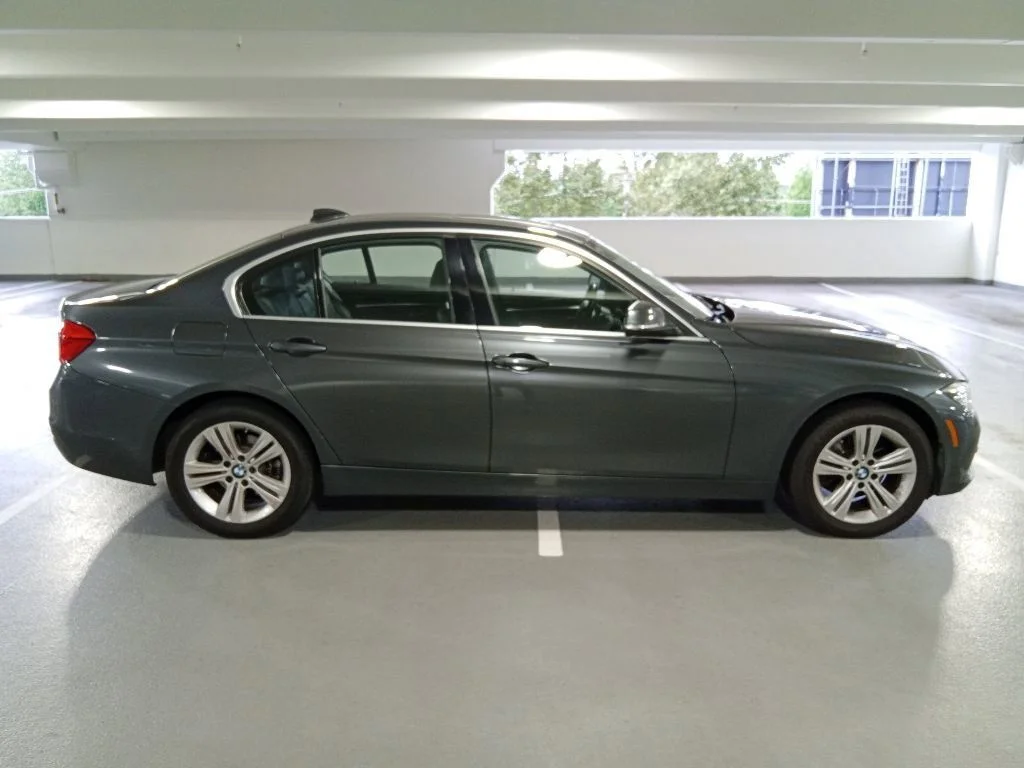 Used 2017 Mineral Gray Metallic BMW 330i xDrive image 4