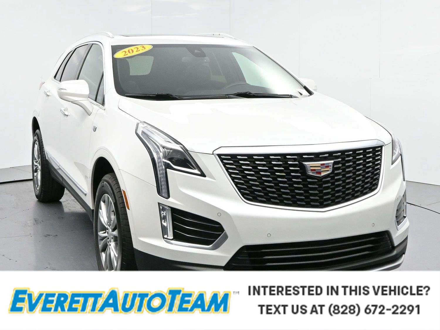 Used 2023 CRYSTAL WHITE TRICOAT Cadillac FWD Premium Luxury image 1
