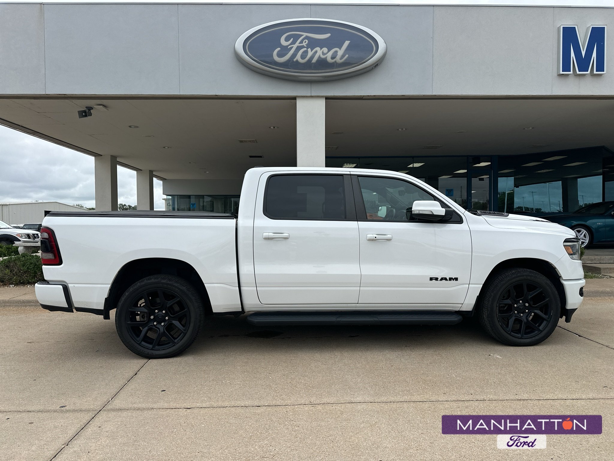 Used 2021 Bright White Ram Sport image 1