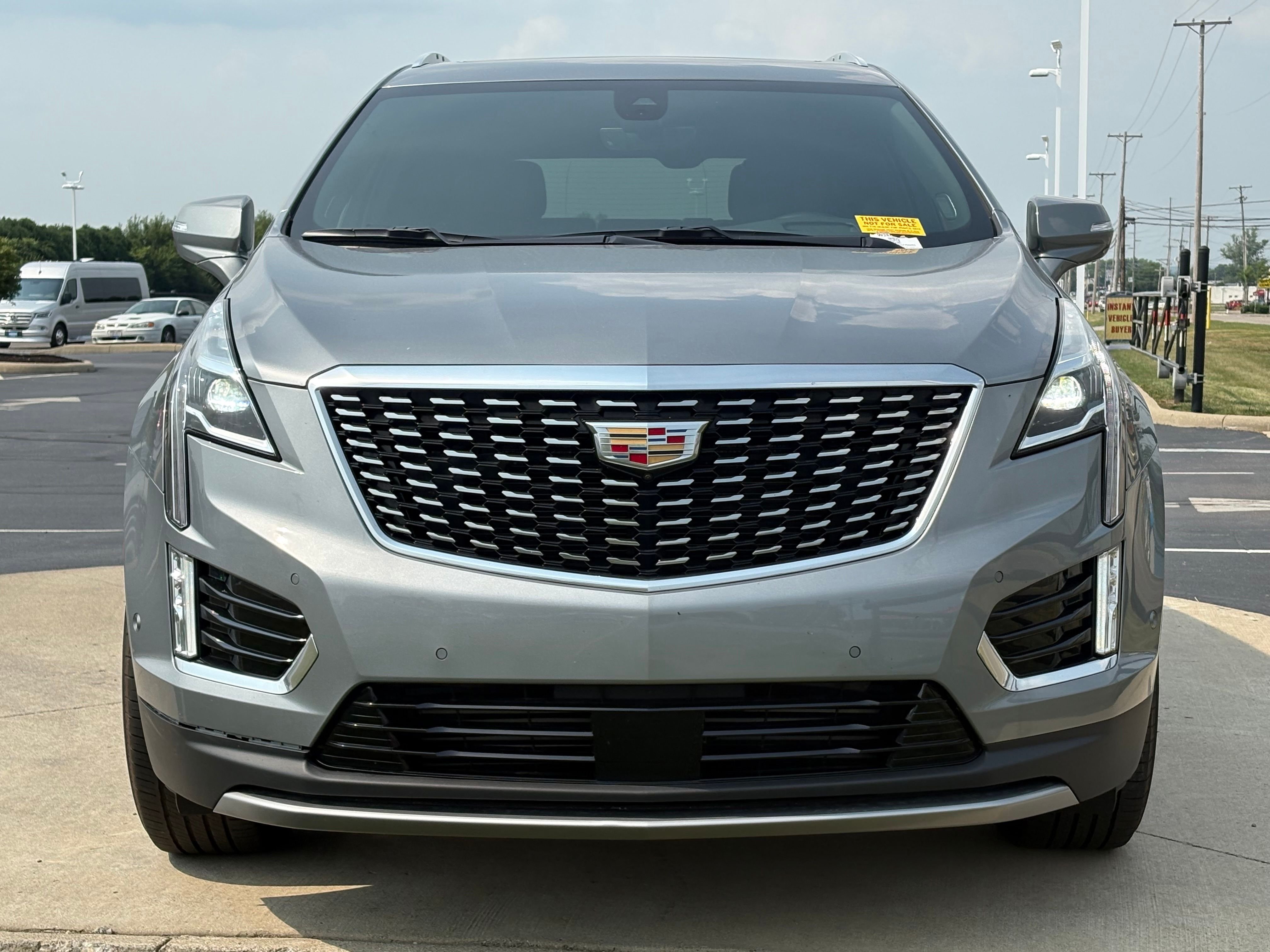 Used 2025 Argent Silver Metallic Cadillac Premium Luxury image 2