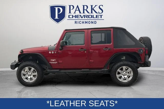 Used 2013 Red Jeep Unlimited Sahara image 5