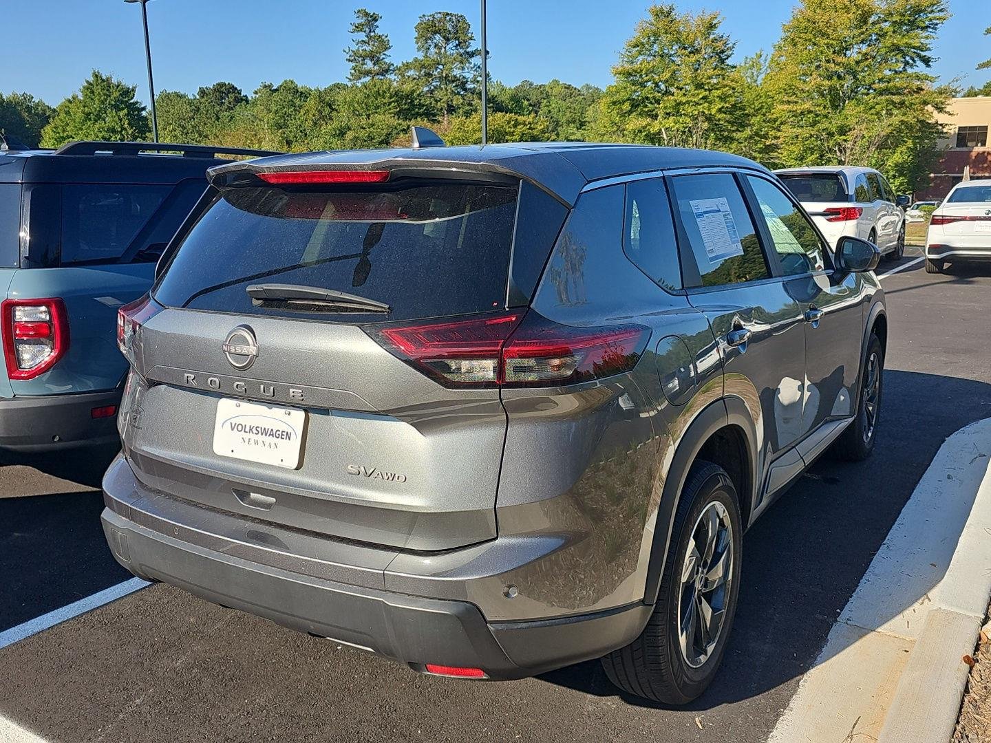Used 2024 Gun Metallic Nissan SV image 6