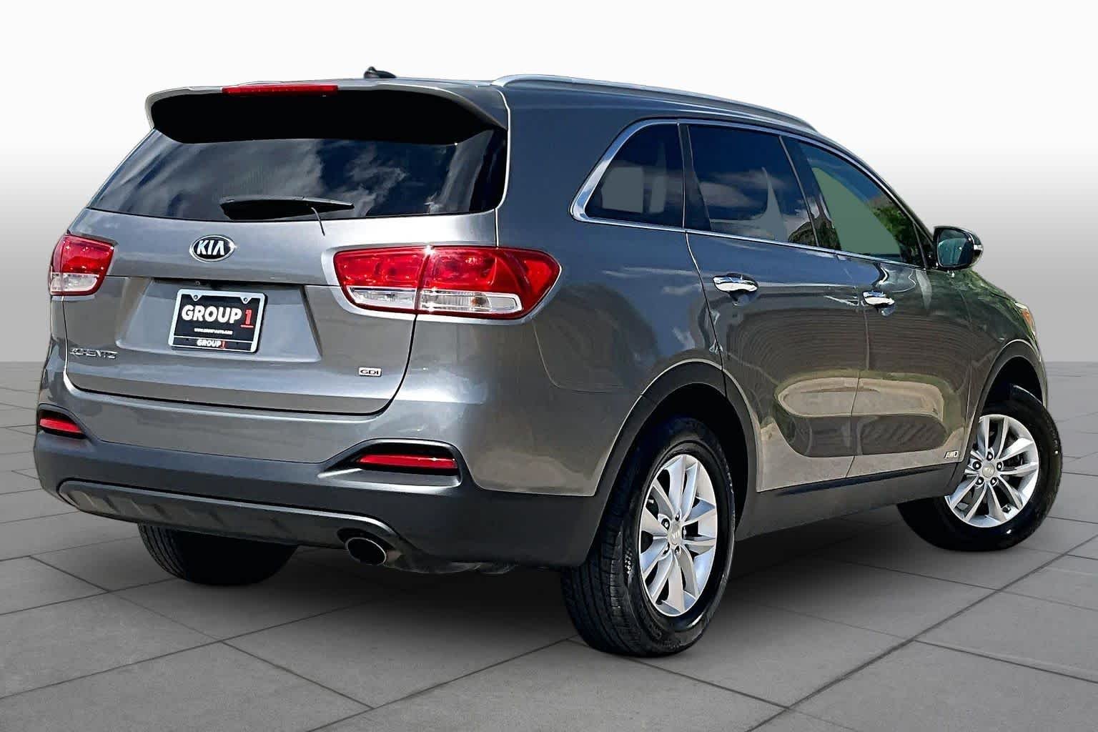 Used 2016 Titanium Silver Kia LX image 13