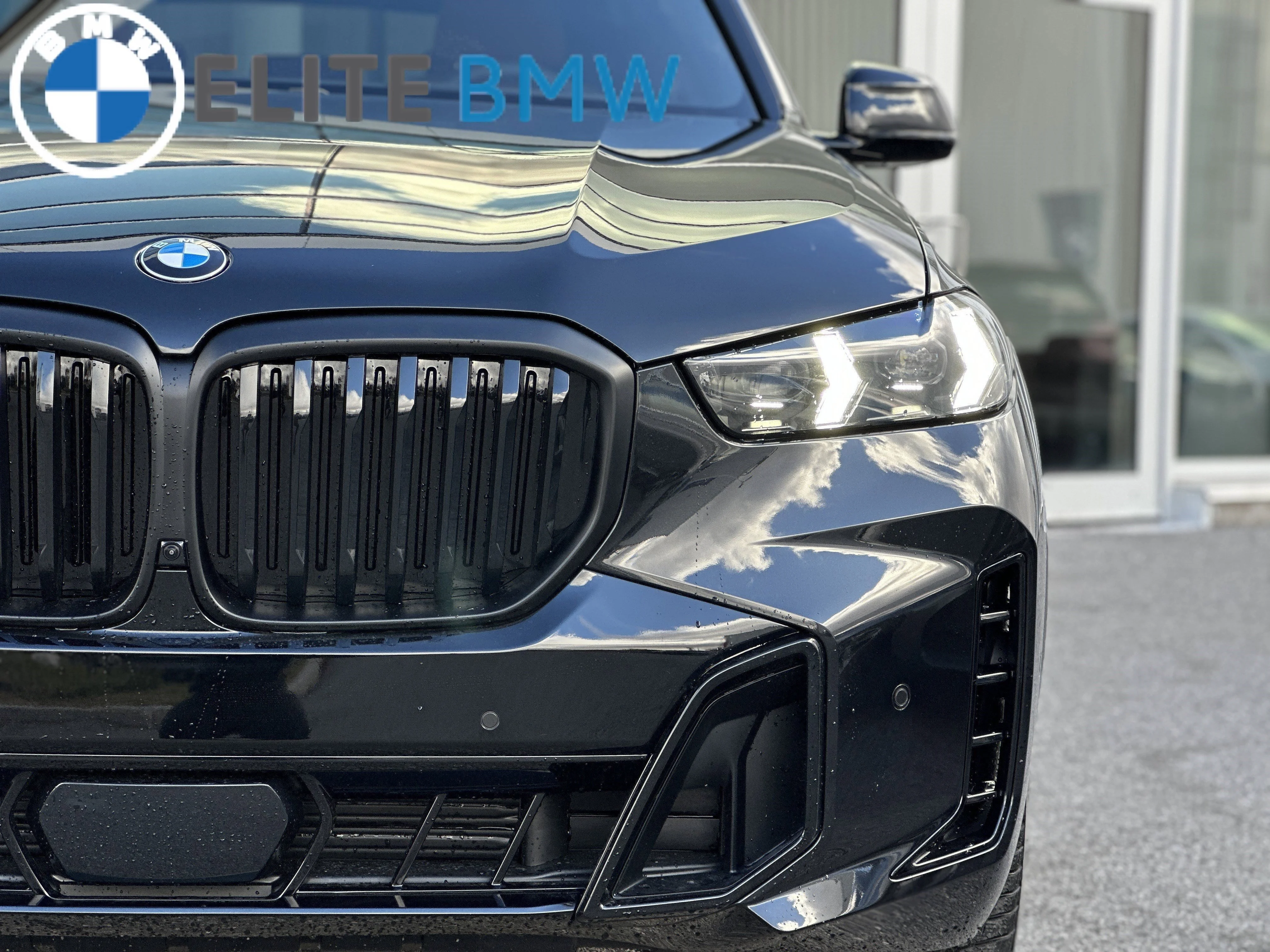 Used 2026 BLACK SAPPHIRE METALLIC BMW XDRIVE40I image 32