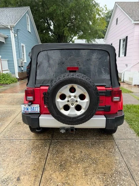 Used 2014 Red Jeep Unlimited Sahara image 29