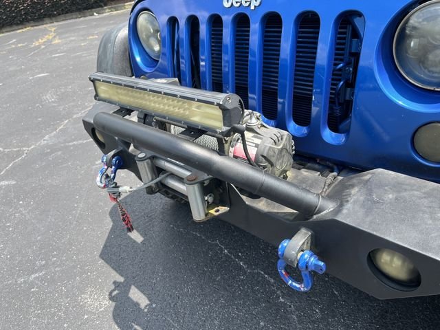 Used 2014 Flame Red Clearcoat Jeep Sport image 11