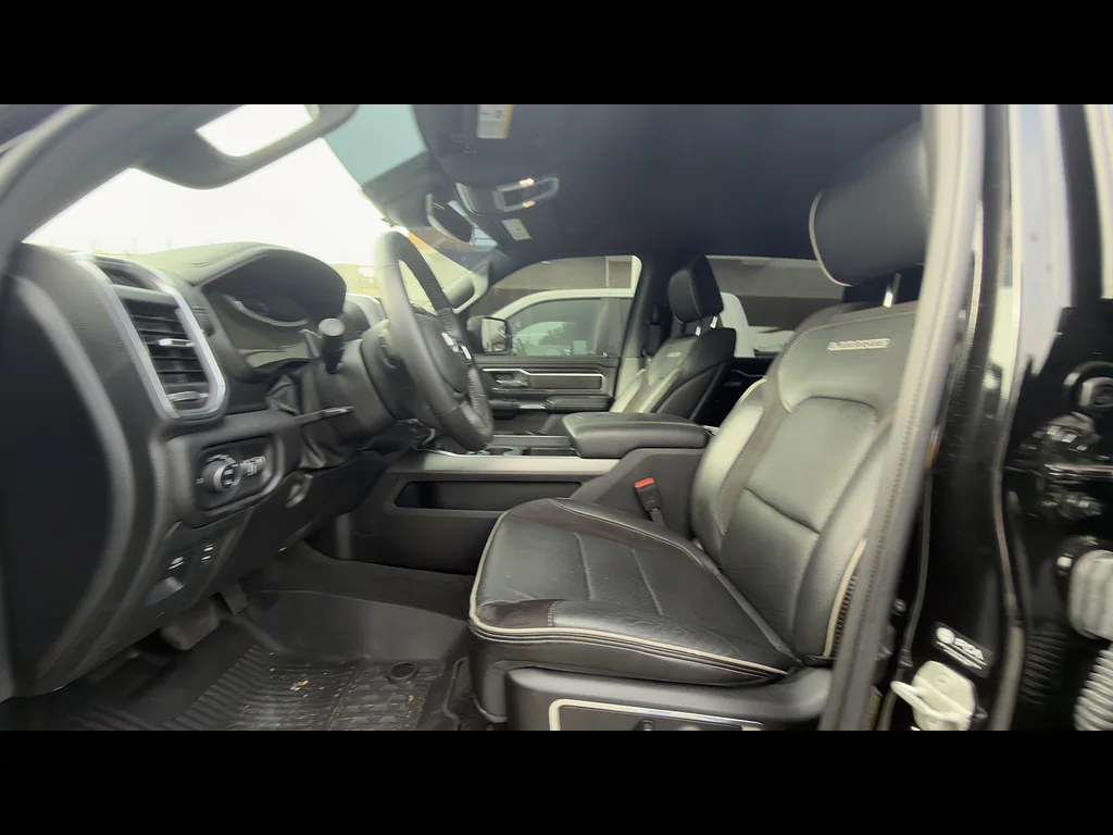 Used 2024 Diamond Black Crystal Pearl Coat Ram Laramie image 6