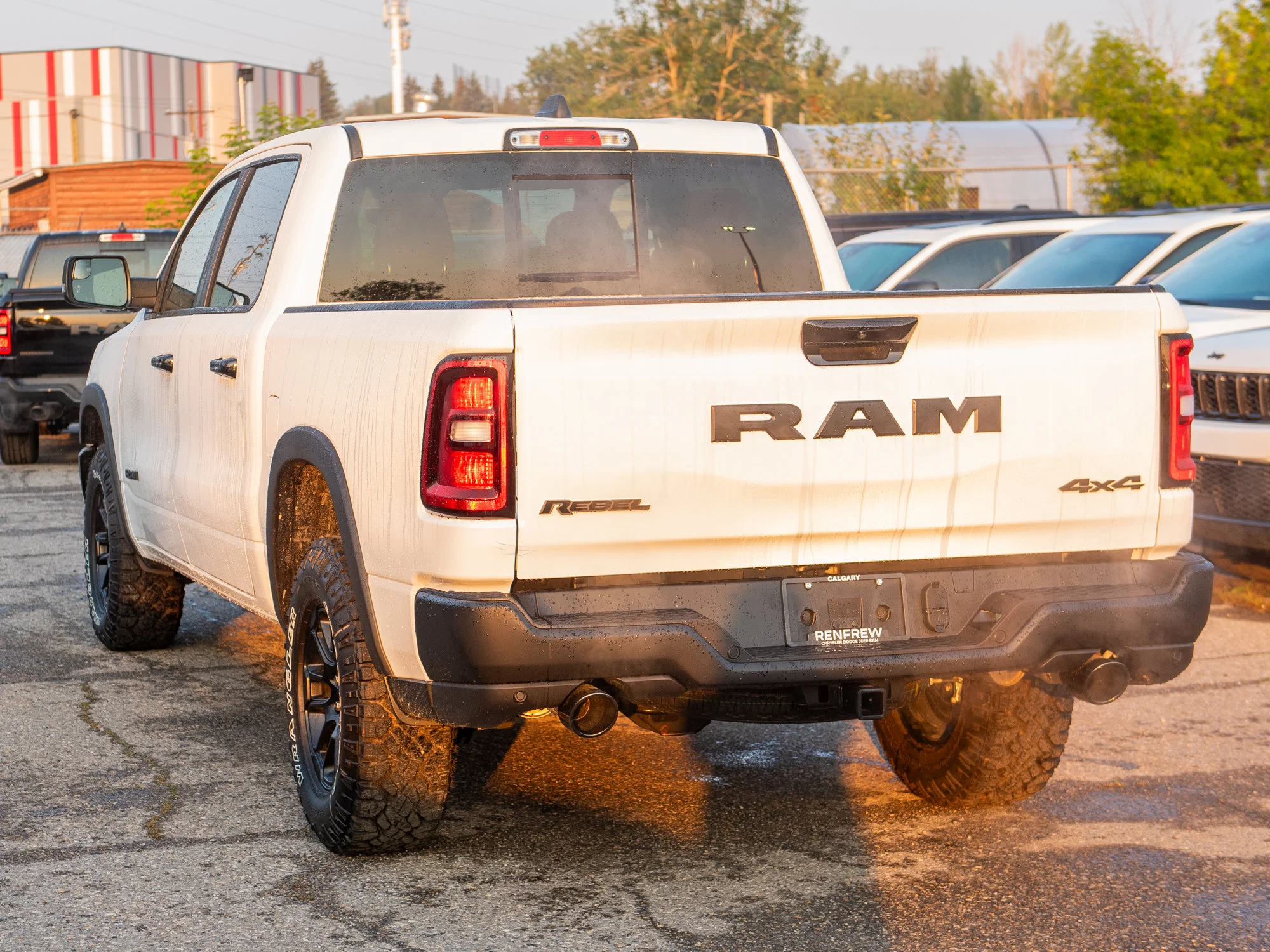 New 2026 White RAM Rebel* Crew Cab 4x4, 33 Inch A/T Tires, Sunroof, Passenger Screen image 4