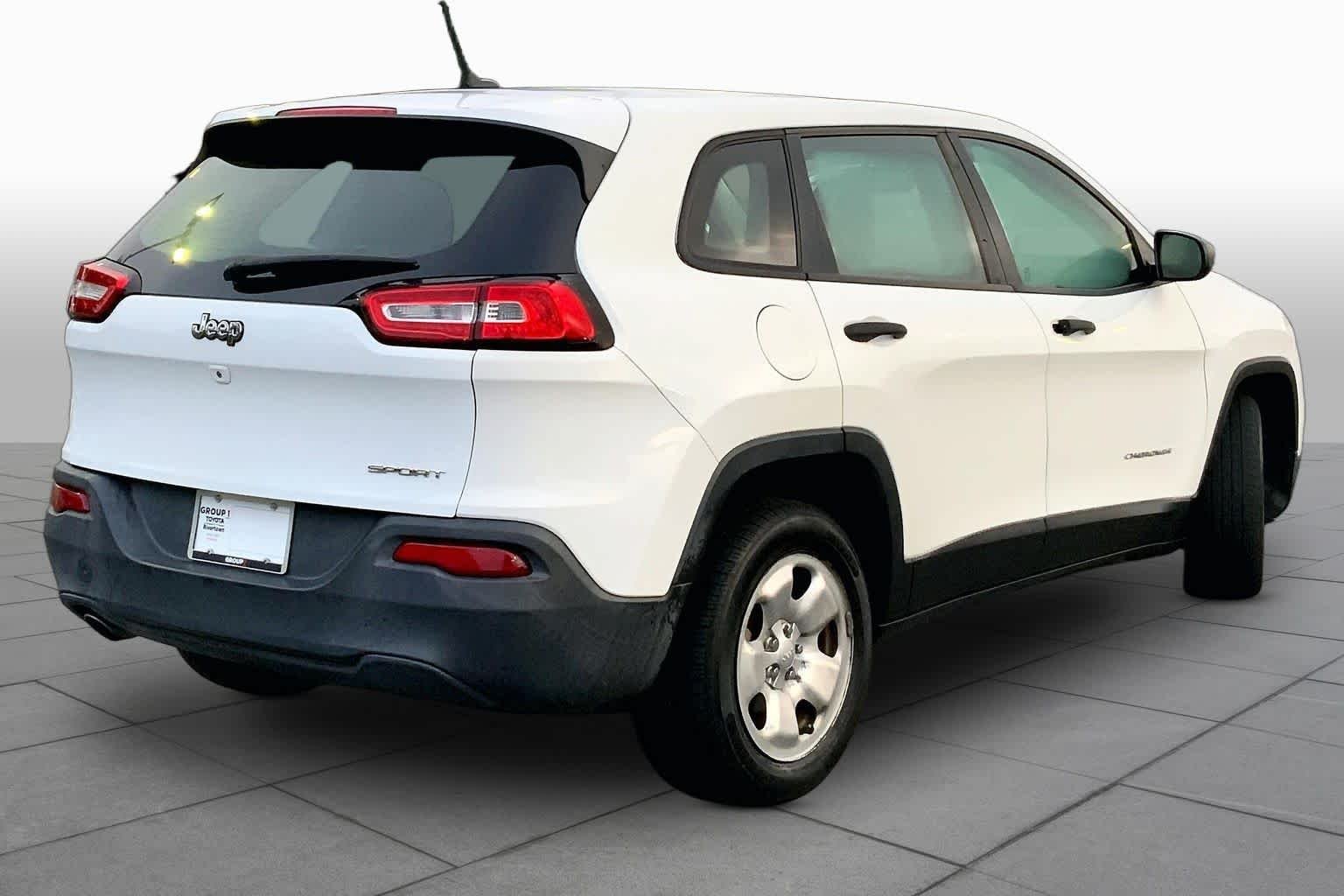 Used 2014 Bright White Clearcoat Jeep Sport image 13