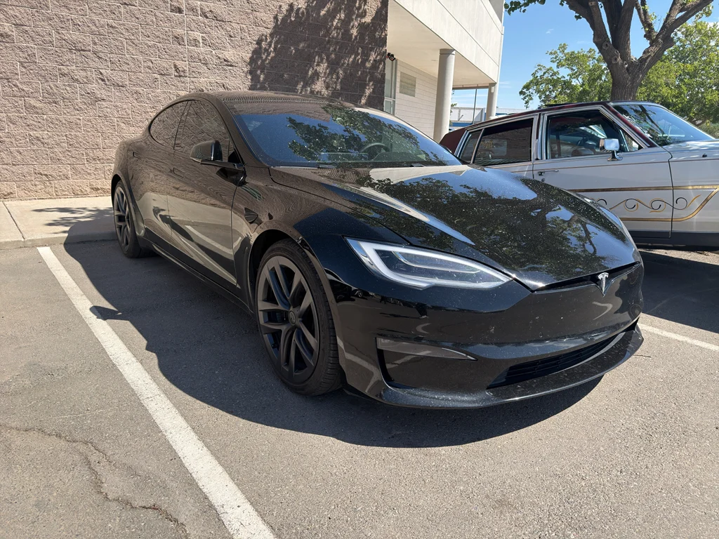 Used 2022 Solid Black Tesla Plaid image 3