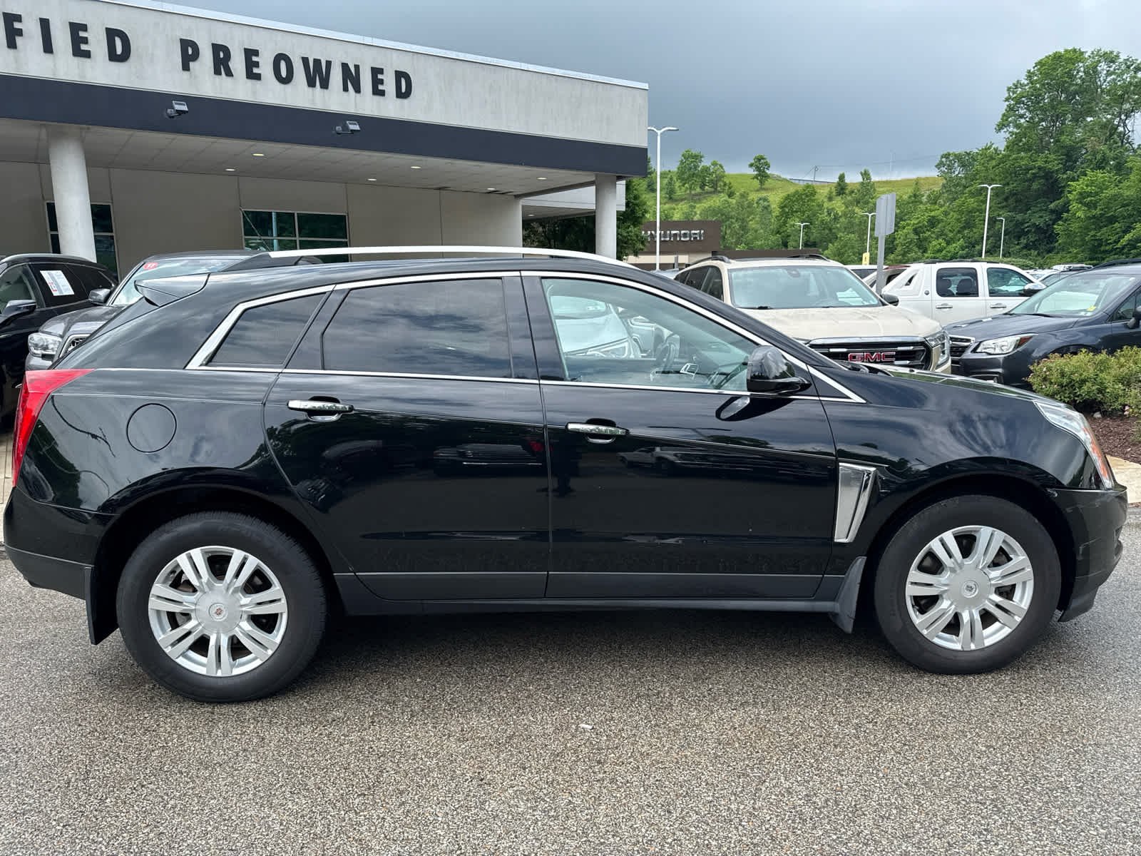 Used 2015 Black Raven Cadillac Luxury Collection image 2
