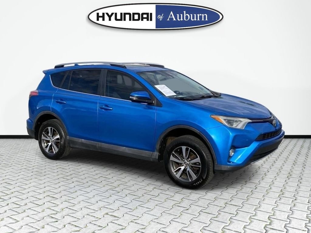 Used 2018 Toyota RAV4 XLE with VIN 2T3WFREV0JW420095 for sale in Auburn, AL