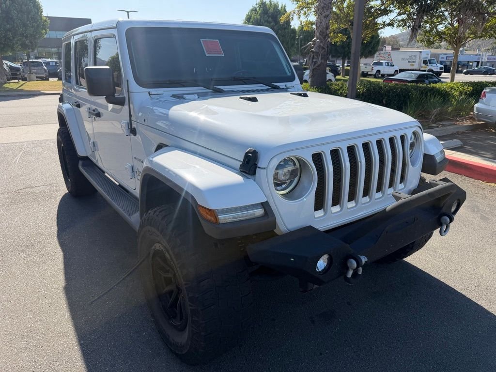 Used 2020 White Jeep Unlimited Sahara image 1