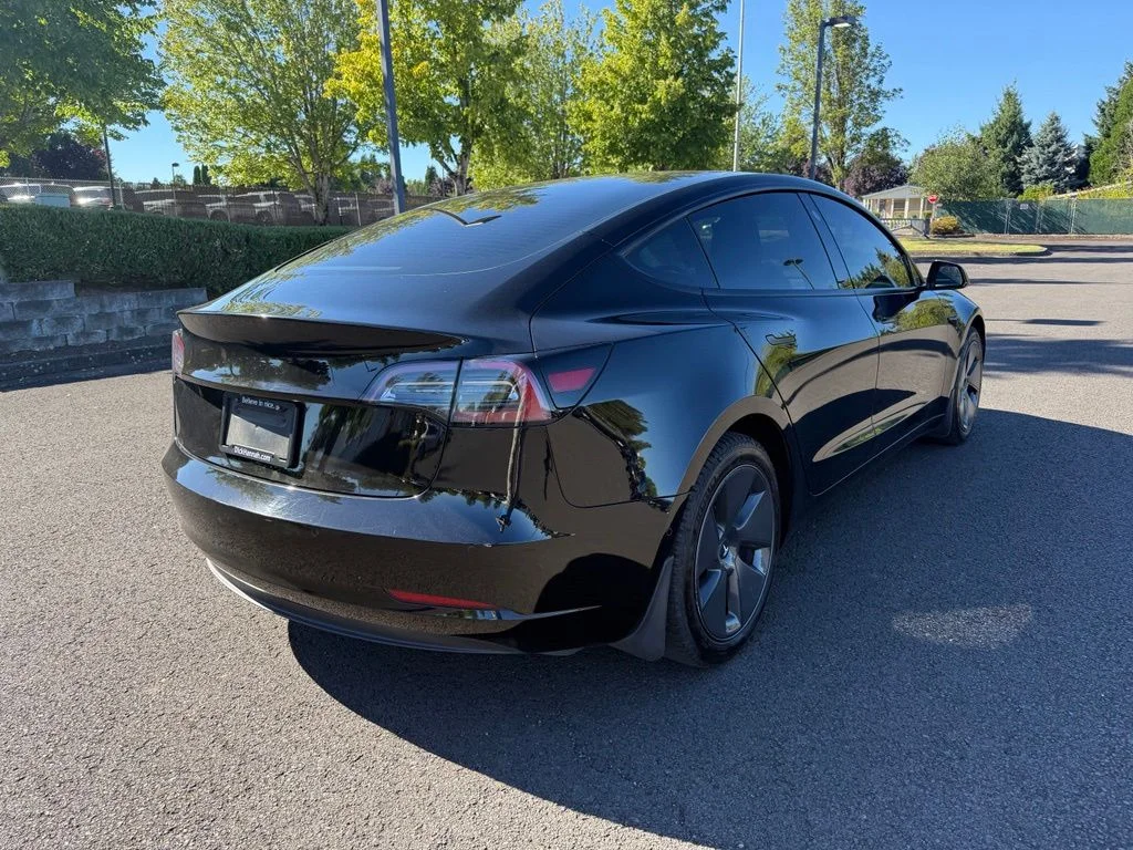 Used 2021 Solid Black Tesla Standard Range Plus image 7