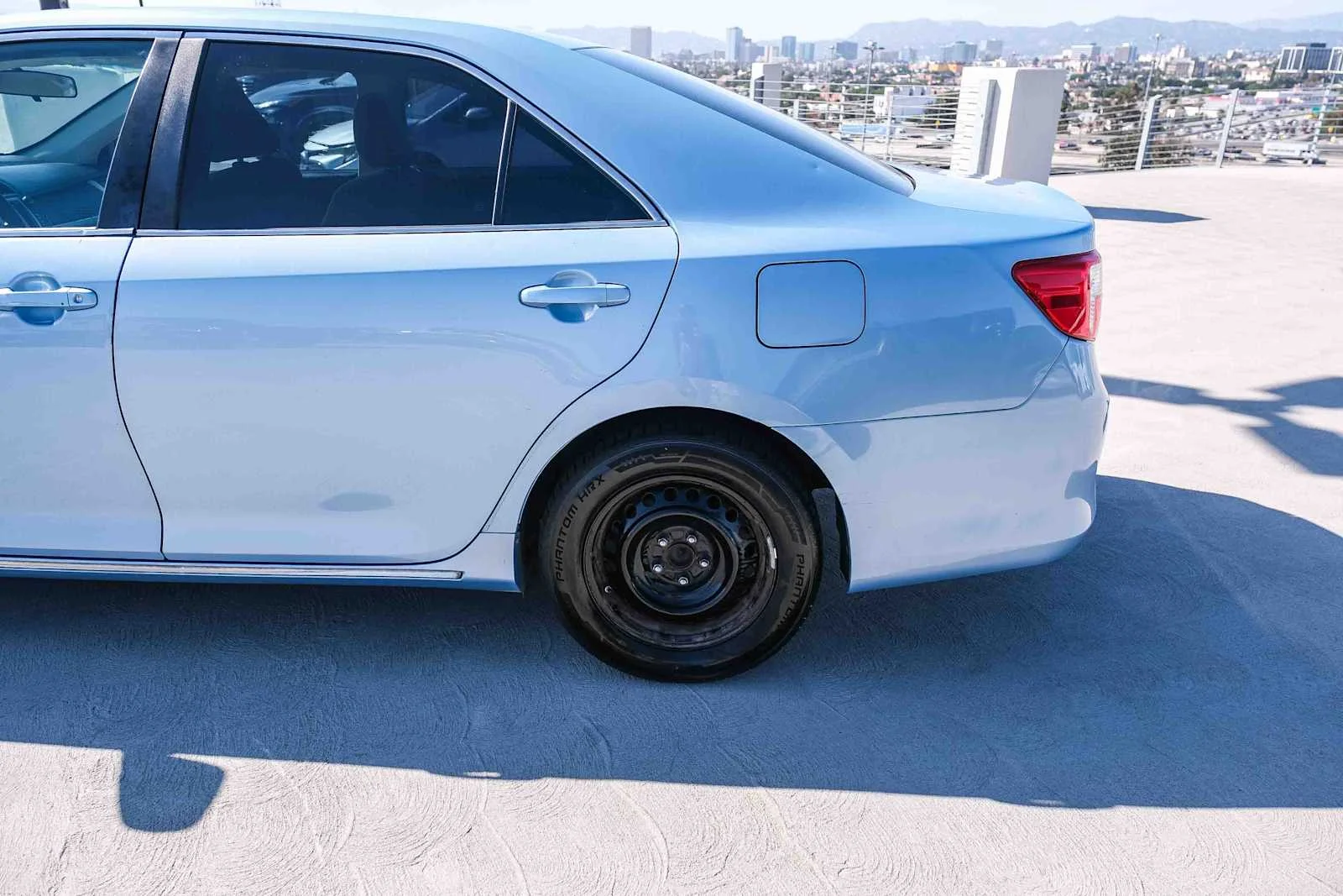 Used 2013 Clearwater Blue Metallic Toyota LE image 8