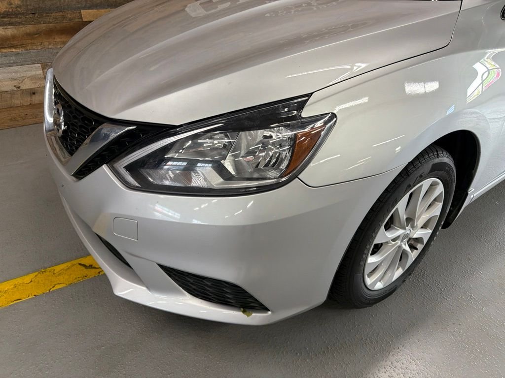 Used 2019 Brilliant Silver Metallic Nissan SV image 3