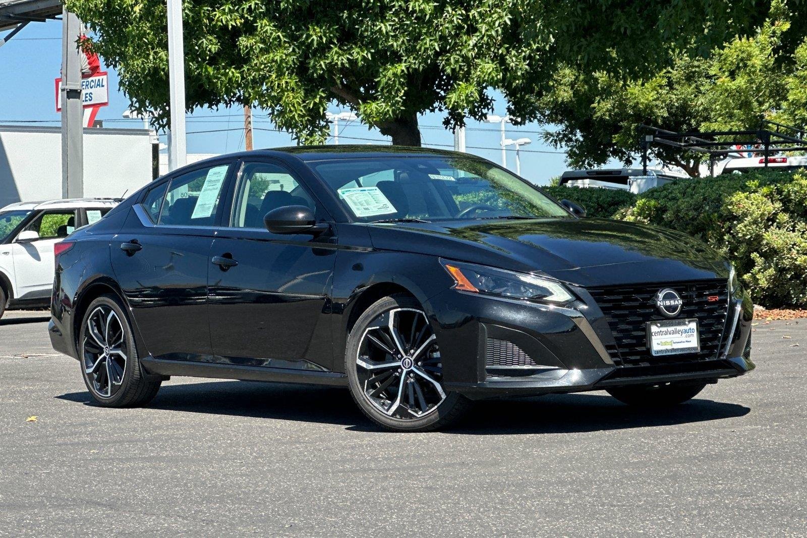 Used 2024 Super Black Nissan 2.5 SR image 1
