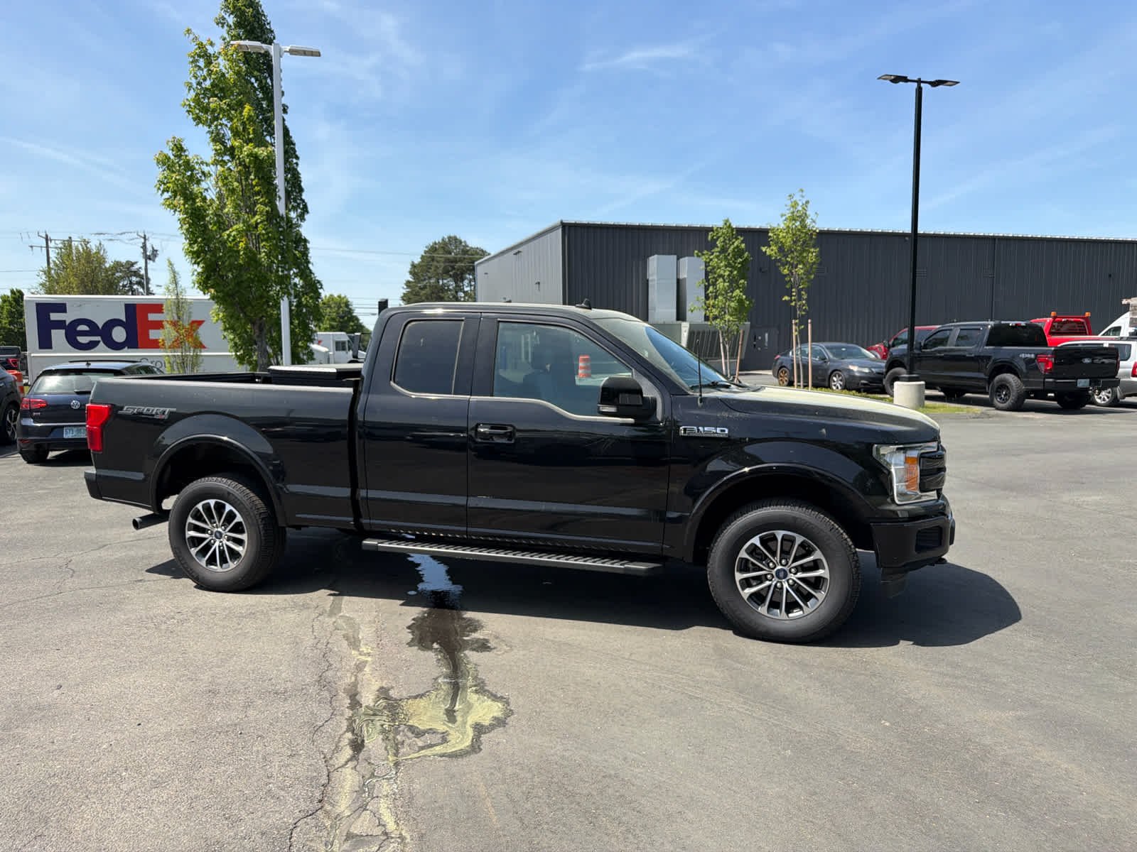 Used 2020 Agate Black Metallic Ford LARIAT image 4