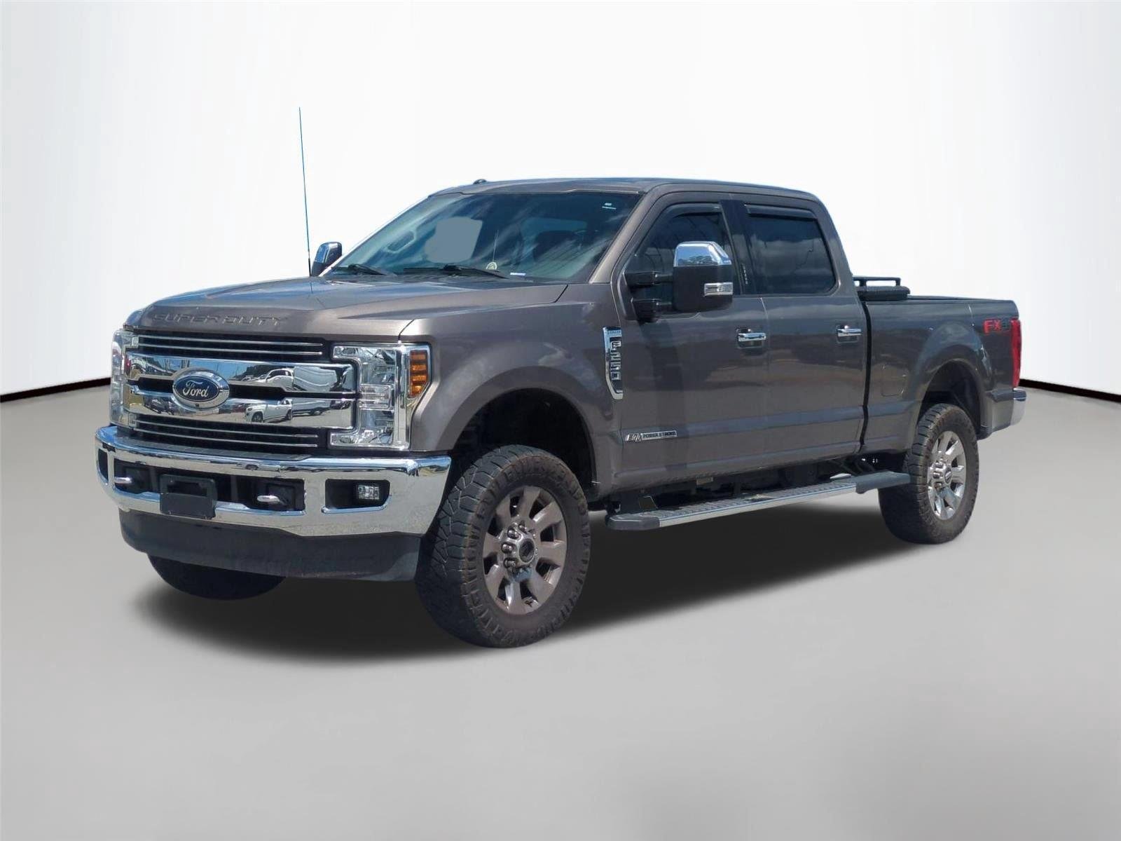 Used 2018 Stone Gray Metallic Ford LARIAT image 1