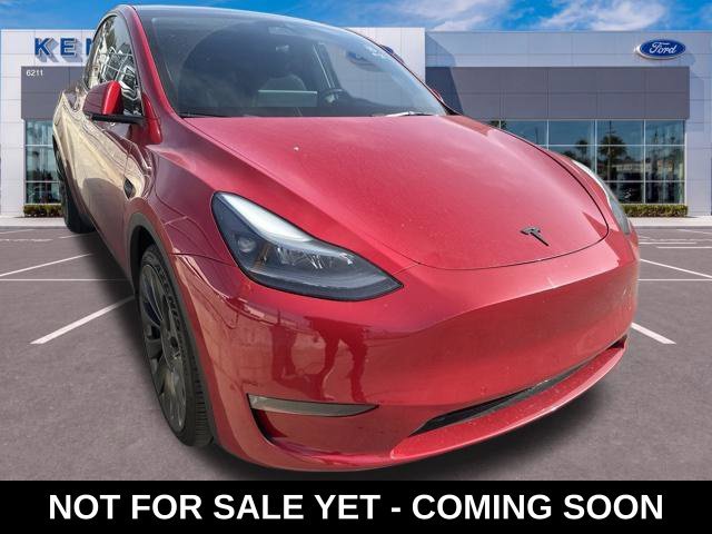 Used 2022 Red Tesla Performance image 1