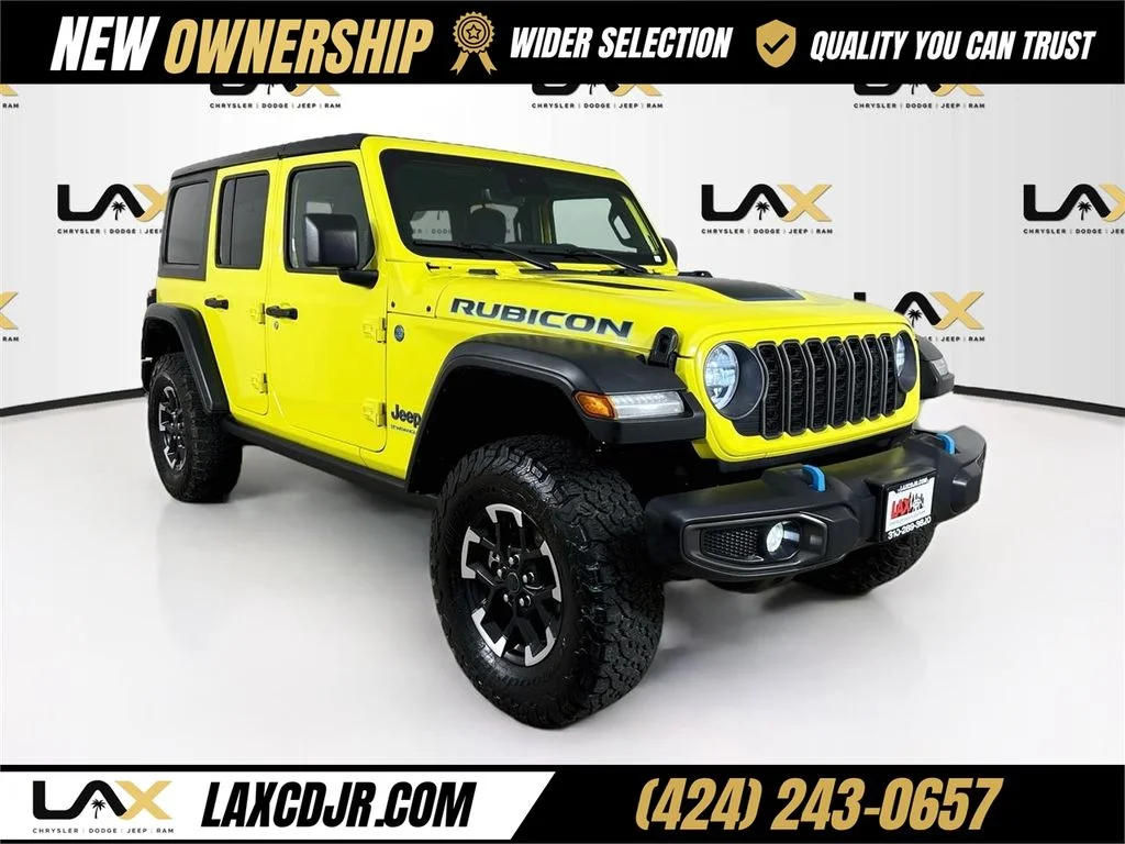 Used 2024 Yellow Jeep Rubicon 4xe image 1