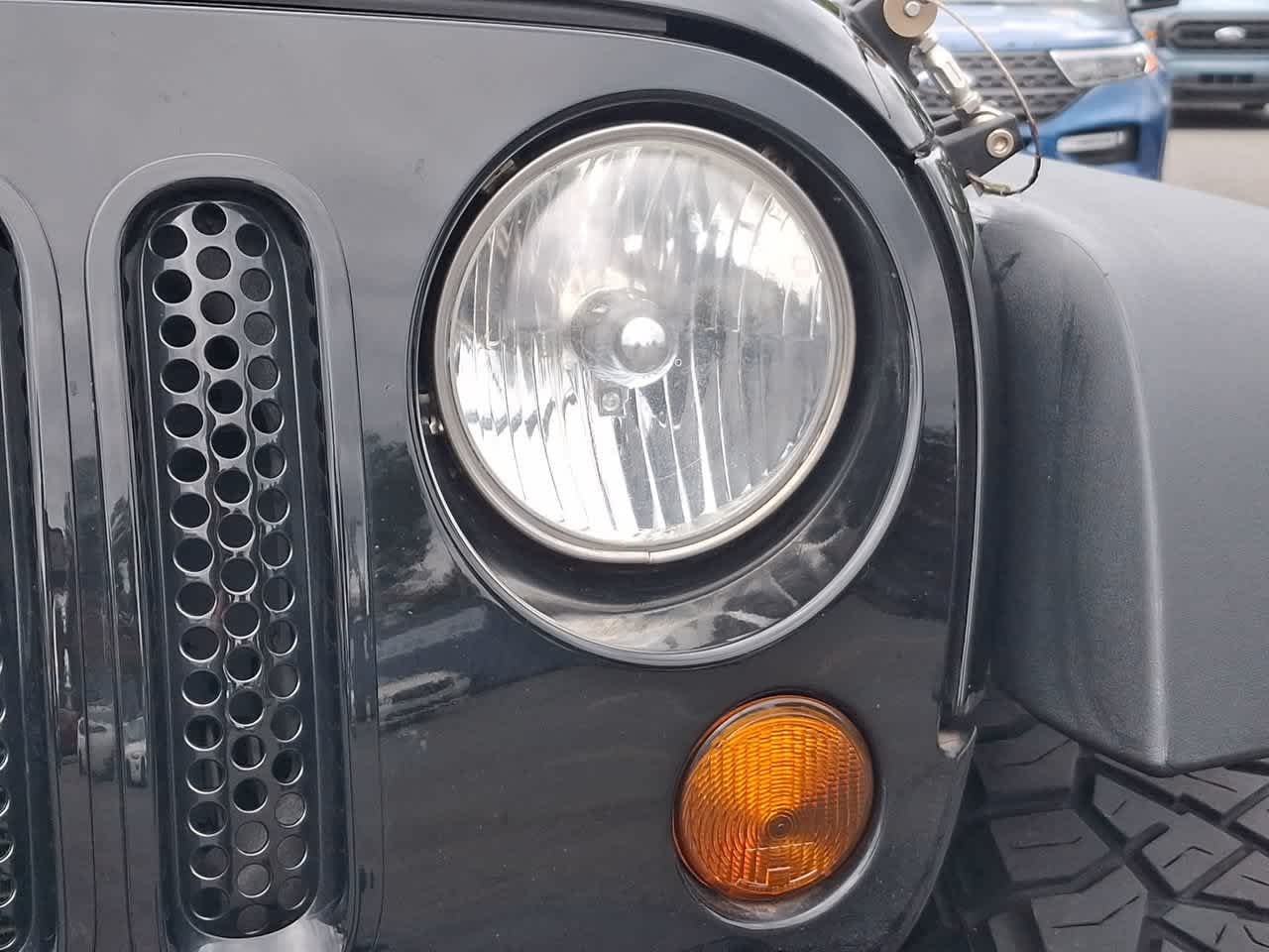Used 2013 Black Clearcoat Jeep Sport image 30