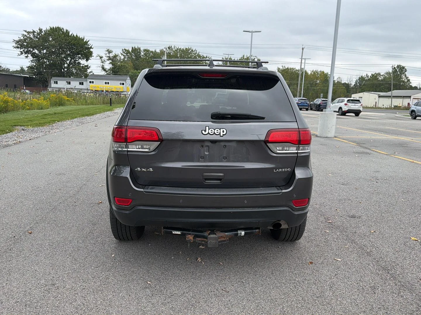 Used 2021 Granite Crystal Metallic Clearcoat Jeep Laredo E image 4