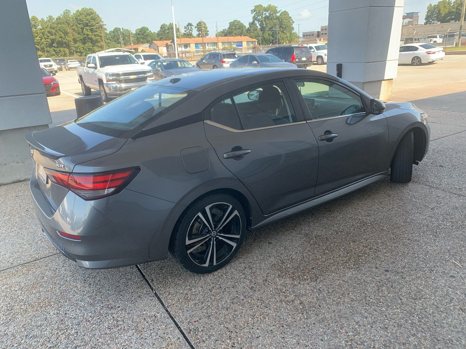 Used 2021 Gun Metallic Nissan SR image 1