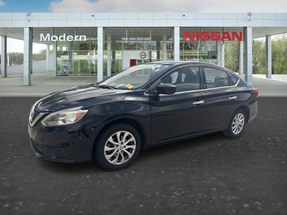 Used 2018 Super Black Nissan SV image 1