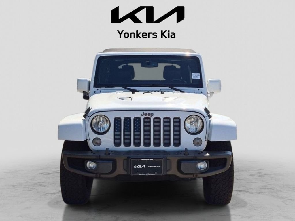 Used 2016 White Jeep Unlimited Sahara image 2