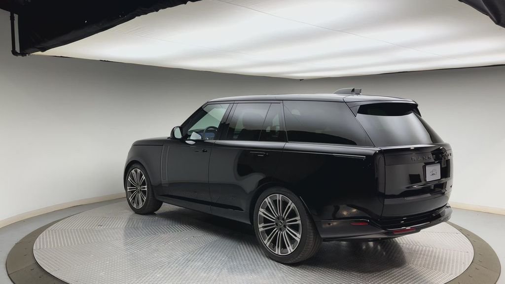 Used 2024 Santorini Black Metallic Land Rover SE image 4
