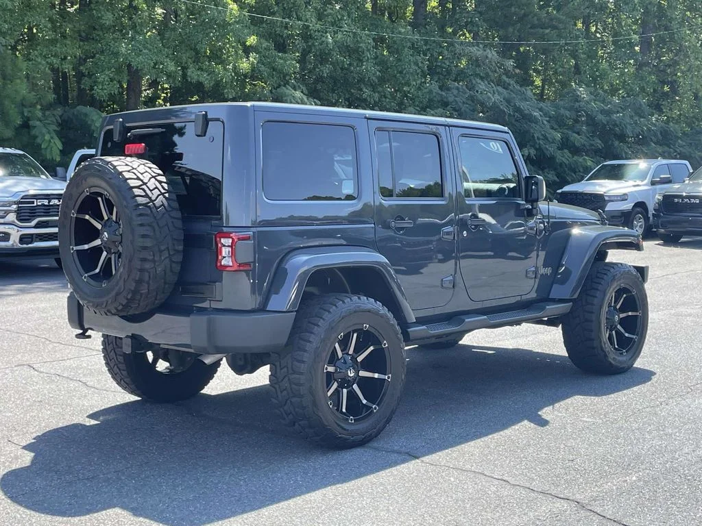 Used 2016 Black Jeep Unlimited Sahara image 8