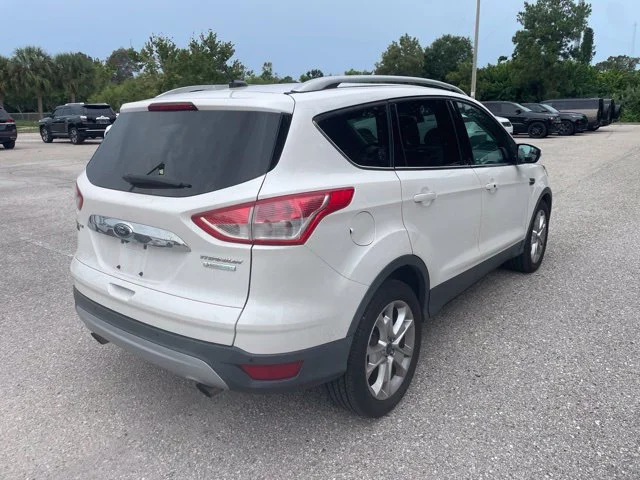 Used 2016 Ford Escape Titanium with VIN 1FMCU0J92GUB66890 for sale in Sarasota, FL