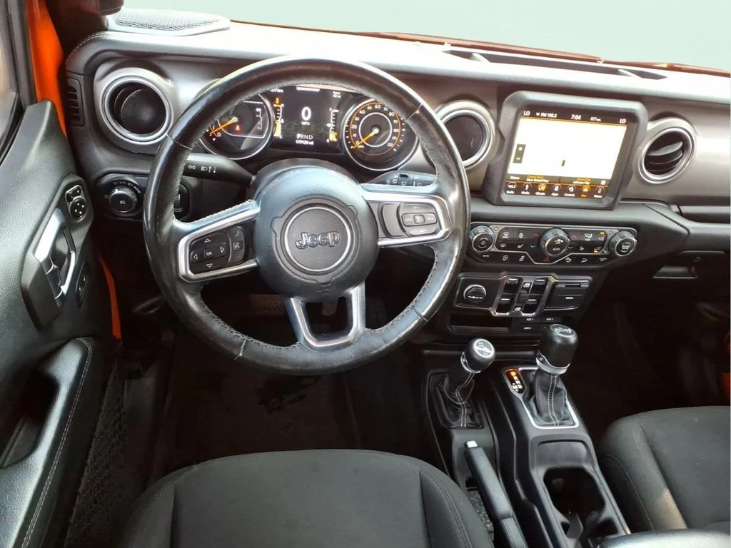 Used 2018 Orange Jeep Unlimited Sahara image 13