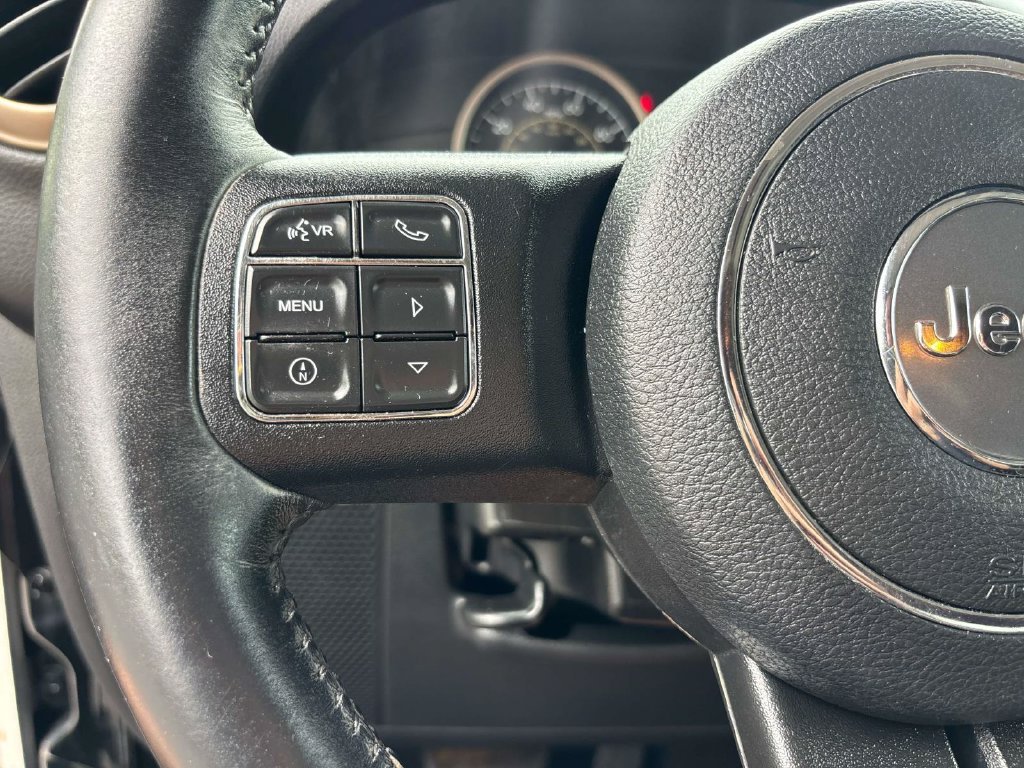 Used 2016 Black Jeep Unlimited Sahara image 16