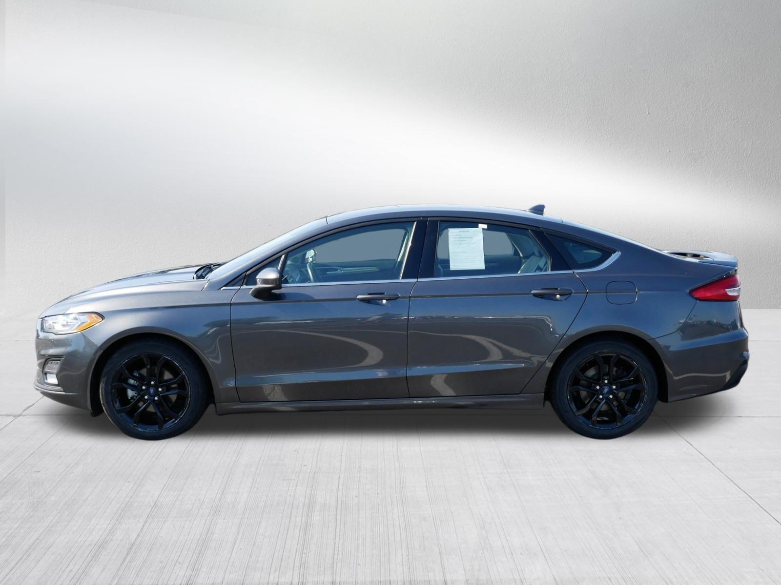 Used 2020 Magnetic Metallic Ford SE image 4