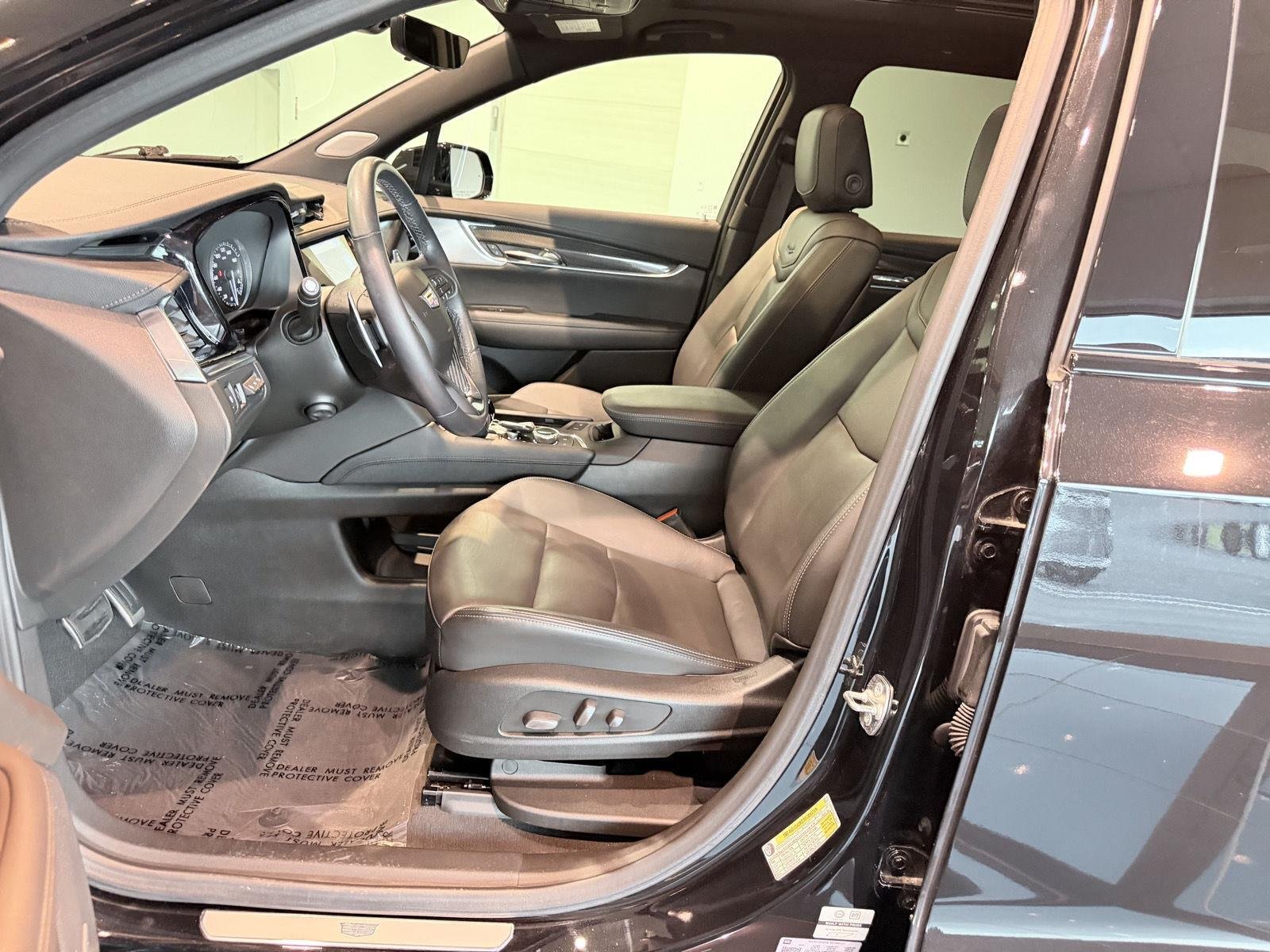 Used 2024 Stellar Black Metallic Cadillac Sport image 33
