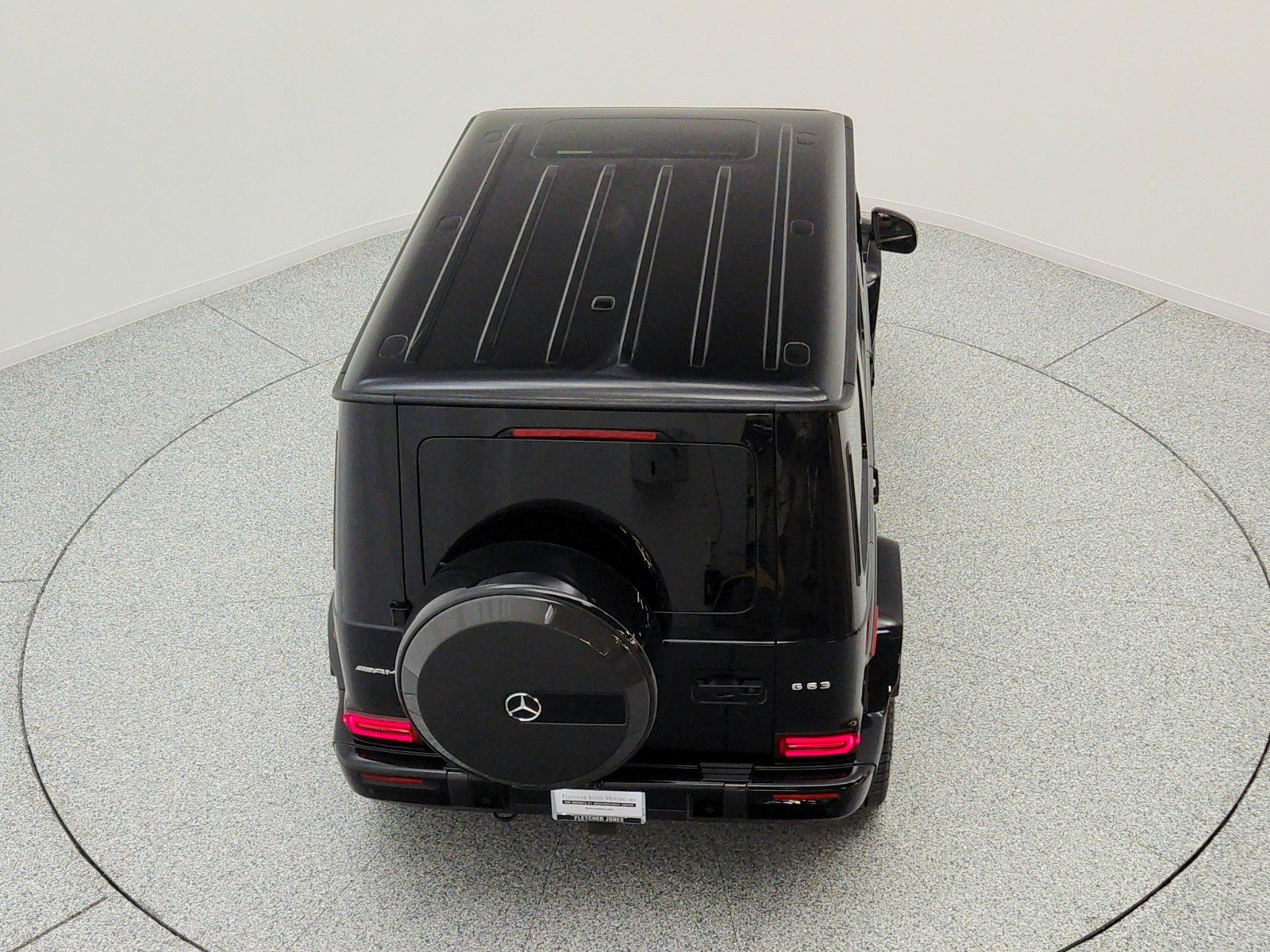Used 2025 Obsidian Black Metallic Mercedes-Benz AMG® G 63 SUV image 28