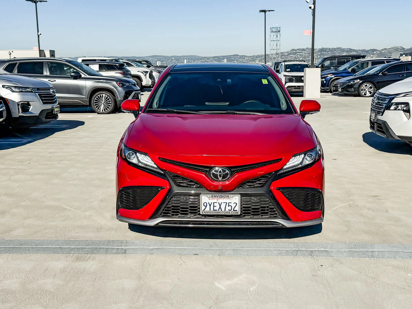 Used 2024 Supersonic Red Toyota XSE V6 image 2
