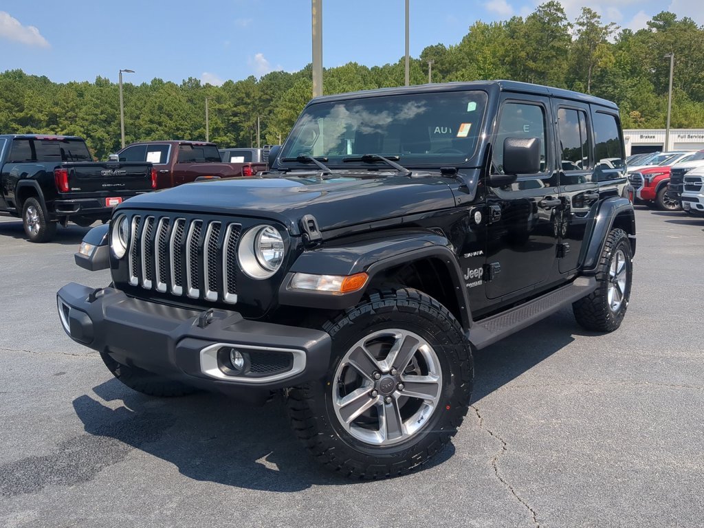 Used 2022 Black Clearcoat Jeep Unlimited Sahara image 1